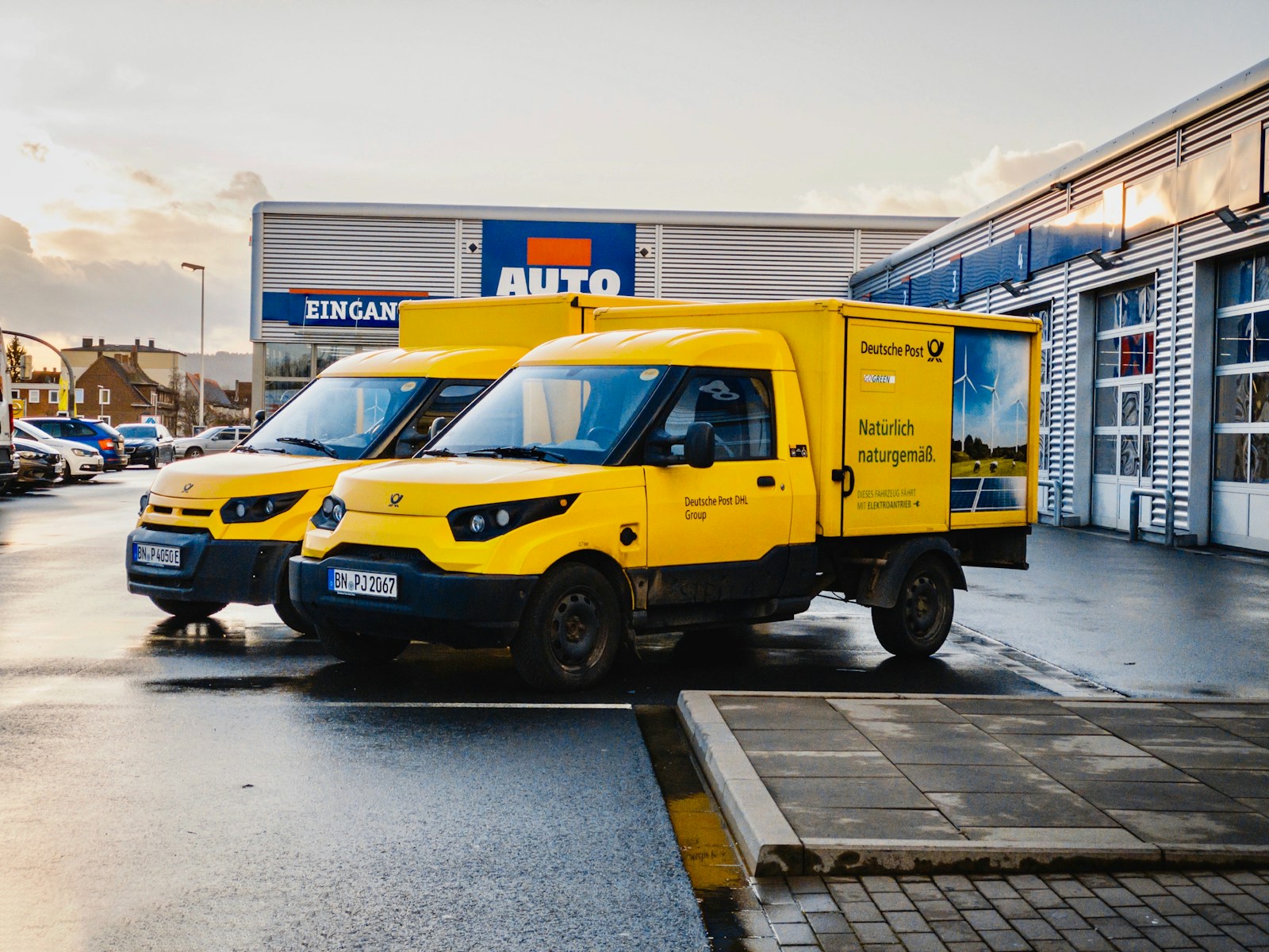 yellow and blue van on road during daytime